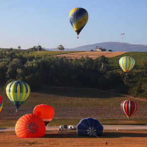 Hot air balloons fly during a hot air ballooning event in Todi